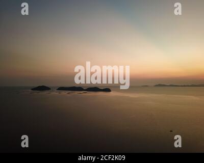 Aerial view Pulau Aman island during sunset. Stock Photo