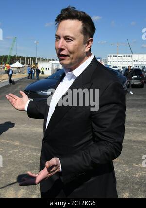 03 September 2020, Brandenburg, Grünheide: Elon Musk, head of Tesla, speaks to media representatives at the Tesla Gigafactory construction site In Grünheide near Berlin, a maximum of 500,000 vehicles per year are to roll off the assembly line from July 2021 - and according to the car manufacturer's plans, the maximum is to be reached as quickly as possible. Photo: Julian Stähle/dpa-Zentralbild/dpa Stock Photo