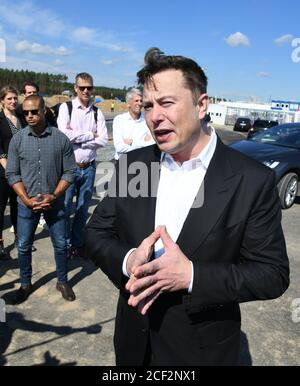 03 September 2020, Brandenburg, Grünheide: Elon Musk, head of Tesla, speaks to media representatives at the Tesla Gigafactory construction site In Grünheide near Berlin, a maximum of 500,000 vehicles per year are to roll off the assembly line from July 2021 - and according to the car manufacturer's plans, the maximum is to be reached as quickly as possible. Photo: Julian Stähle/dpa-Zentralbild/dpa Stock Photo