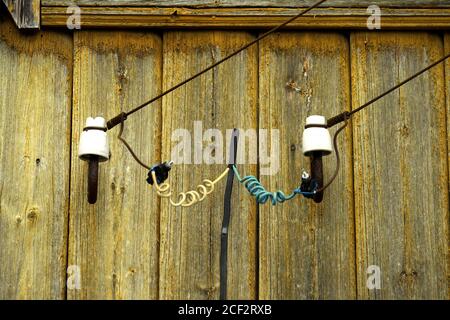 Old Outdated Electrical Wiring in the ceiling of an old house. Stock Photo