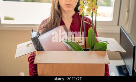 Young woman fired from work Stock Photo