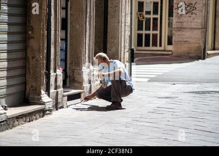 terni,italy september 02 2020:house painter at work on a shop Stock Photo