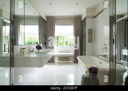 Sink and bath in modern bathroom Stock Photo