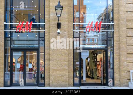 H & M shop, retail outlet exterior in shopping area Covent Garden, London, England, UK Stock Photo