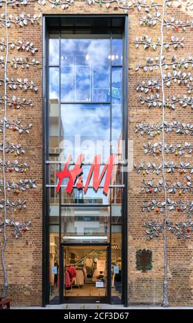 H & M shop, retail outlet exterior in shopping area Covent Garden, London, England, UK Stock Photo