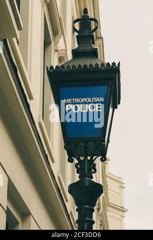 Traditional 'blue lamp', Metropolitan Police station street light, Charing Cross Police Station Agar House, London, England, UK Stock Photo