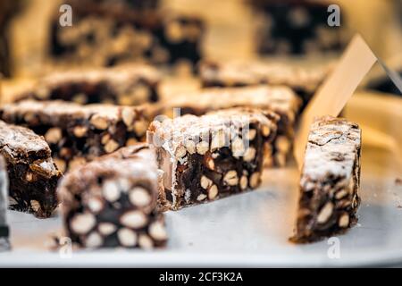 Closeup view of panforte chocolate dessert display made with fruits and nuts in Siena, Italy in Tuscany Stock Photo