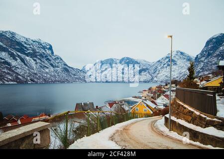 Small town near sea and snowy mountains Stock Photo