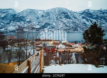 Small town near sea and snowy mountains Stock Photo