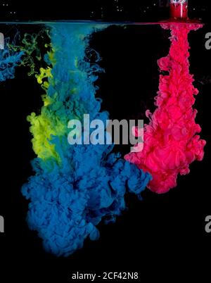 Colorful acrylic Ink blend in water. Color Explosion. Stock Photo