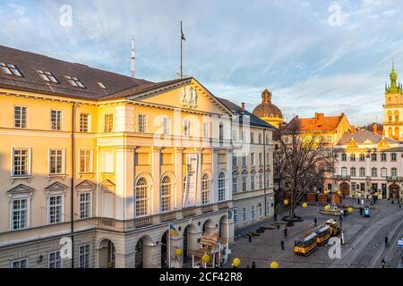 Lviv, Ukraine - January 21, 2020: Old town rynok famous square in Lvov with exterior view of historic building Ratusha City Hall architecture during s Stock Photo
