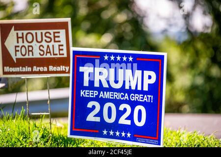 Afton, USA - August 30, 2020: Presidential election political sign in support of Donald J. Trump with Keep America Great 2020 text and house for sale