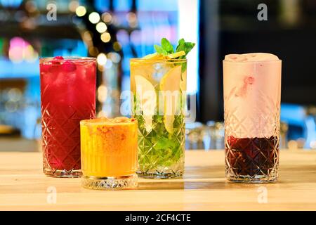 Classic cold cocktails - rum and cola, mojito and clover club (soft focus photo with shallow depth of field) Stock Photo