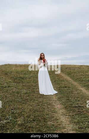 Young women in white dress in nature Stock Photo