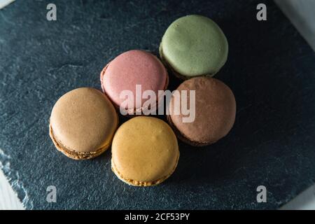 Fresh crunchy macaroons on table Stock Photo