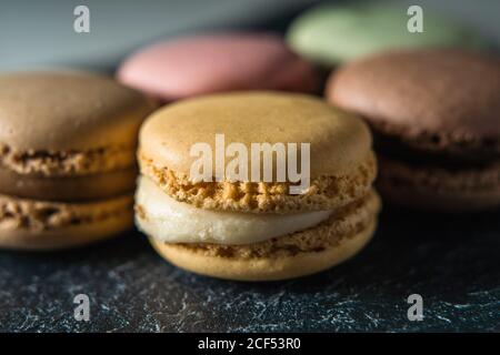 Fresh crunchy macaroons on table Stock Photo