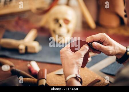 close up Master a man handds in an apron bake for skin products. Small business Stock Photo