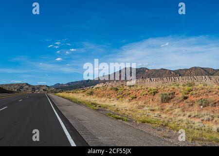 Monument Valley Road. Empty asphalt highway. Travel background. Stock Photo