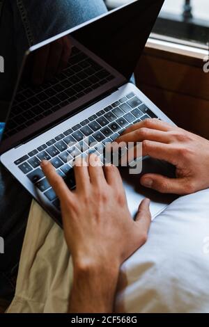 Freelancer using laptop at home Stock Photo