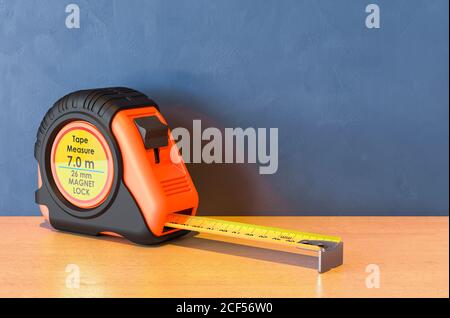 Tape Measure on the wooden table. 3D rendering Stock Photo