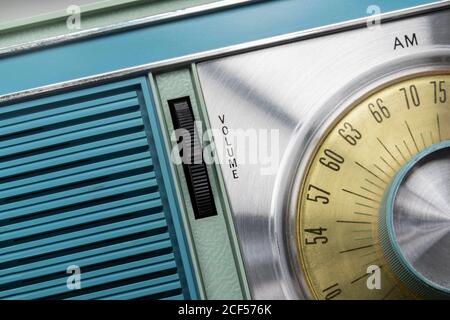 Macro view of volume dial on vintage portable radio. Stock Photo