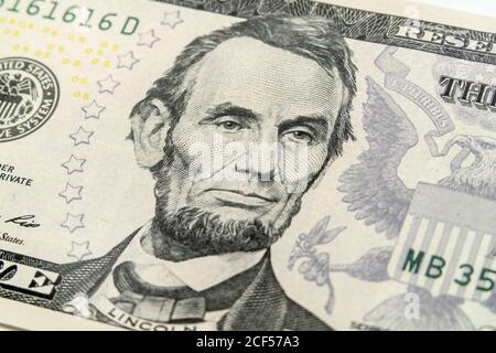 Macro view of Abraham Lincoln on the US five dollar bill. Stock Photo