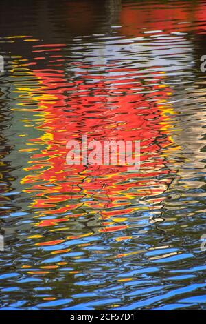 Narrowboat reflections in the Rochdale Canal, Hebden Bridge, Pennines, Yorkshire Stock Photo