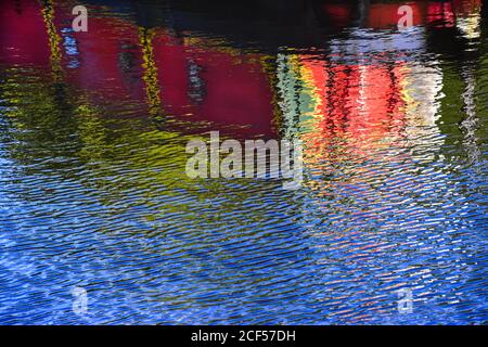 Narrowboat reflections in the Rochdale Canal, Hebden Bridge, Pennines, Yorkshire Stock Photo