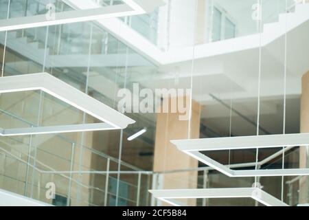 square ceiling lamp on the blue background. Stock Photo