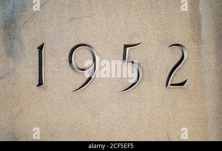 1952 inscribed on a Sandstone wall. Stock Photo