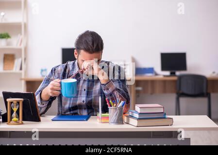Young student sitting in the classroom Stock Photo