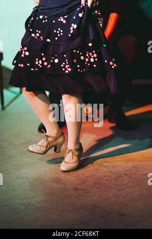 Crop anonymous female flamenco dancer on stage Stock Photo