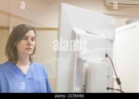 Female doctor using digital equipment for mammography Stock Photo