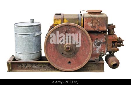 Rusty  vintage  small  tractors  diesel engine . The metal equipment is made more than hundred years ago. Mass production. Stock Photo