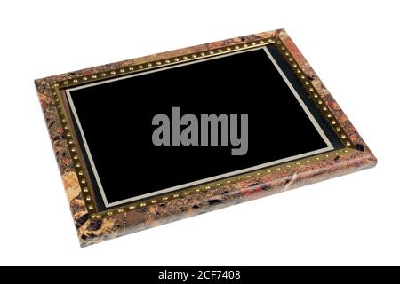 Old wooden vintage photo frame  lie on table. Isolated on white  macro Stock Photo