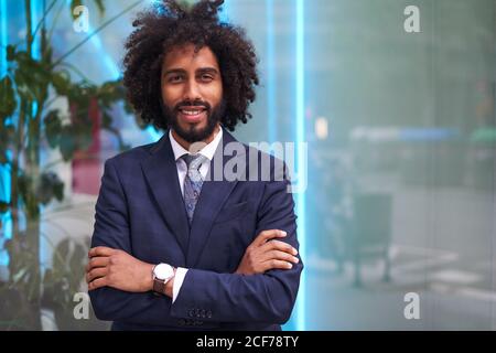 Successful black businessman in suit smiling Stock Photo