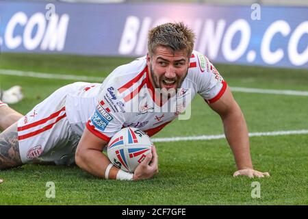 Greg Minikin (5) of Hull KR breaks through to go over for a try Stock Photo