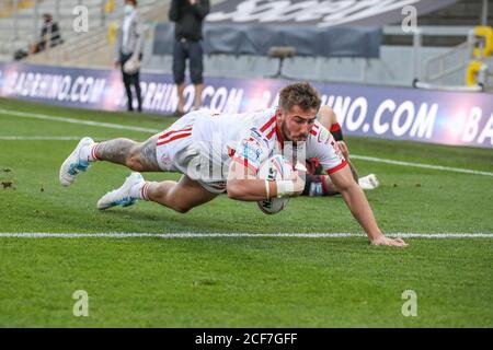 Greg Minikin (5) of Hull KR breaks through to go over for a try Stock Photo