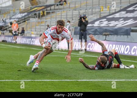 Greg Minikin (5) of Hull KR breaks through to go over for a try Stock Photo