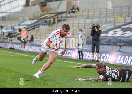 Greg Minikin (5) of Hull KR breaks through to go over for a try Stock Photo