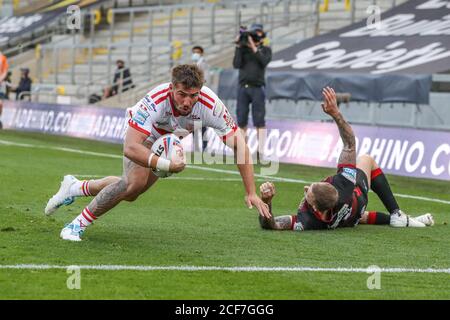 Greg Minikin (5) of Hull KR breaks through to go over for a try Stock Photo