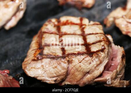Steak on the grill with a lozenge pattern Stock Photo