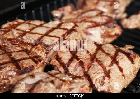 Steak on the grill with a lozenge pattern Stock Photo