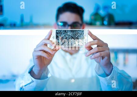 Man showing broken smartphone display Stock Photo