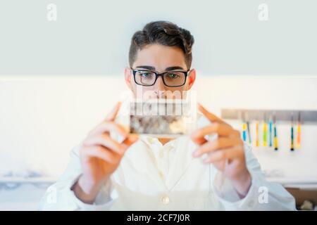 Man showing broken smartphone display Stock Photo