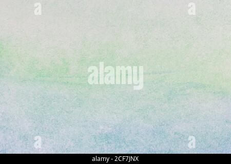 Paper background with a blue to green gradation Stock Photo
