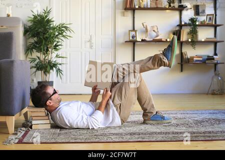 Man of the house during a break in work Stock Photo