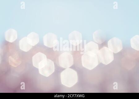 Soft lights hexagon bokeh background. Pink blue background. Pastel colors, holidays concept. Stock Photo