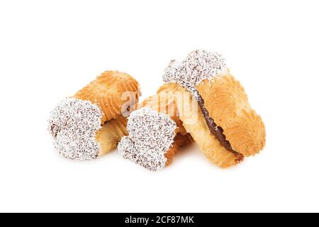 sandwich biscuits with jam decorated with Coconut chips isolated on white background Stock Photo