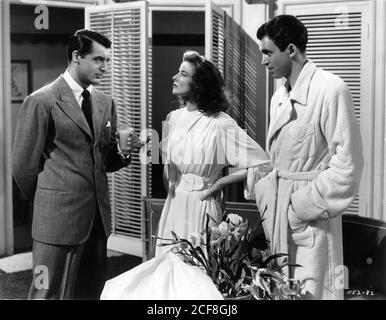 CARY GRANT KATHARINE HEPBURN and JAMES STEWART in THE PHILADELPHIA STORY 1940 director GEORGE CUKOR play Philip Barry screenplay Donald Ogden Stewart gowns by Gilbert Adrian Metro Goldwyn Mayer Stock Photo